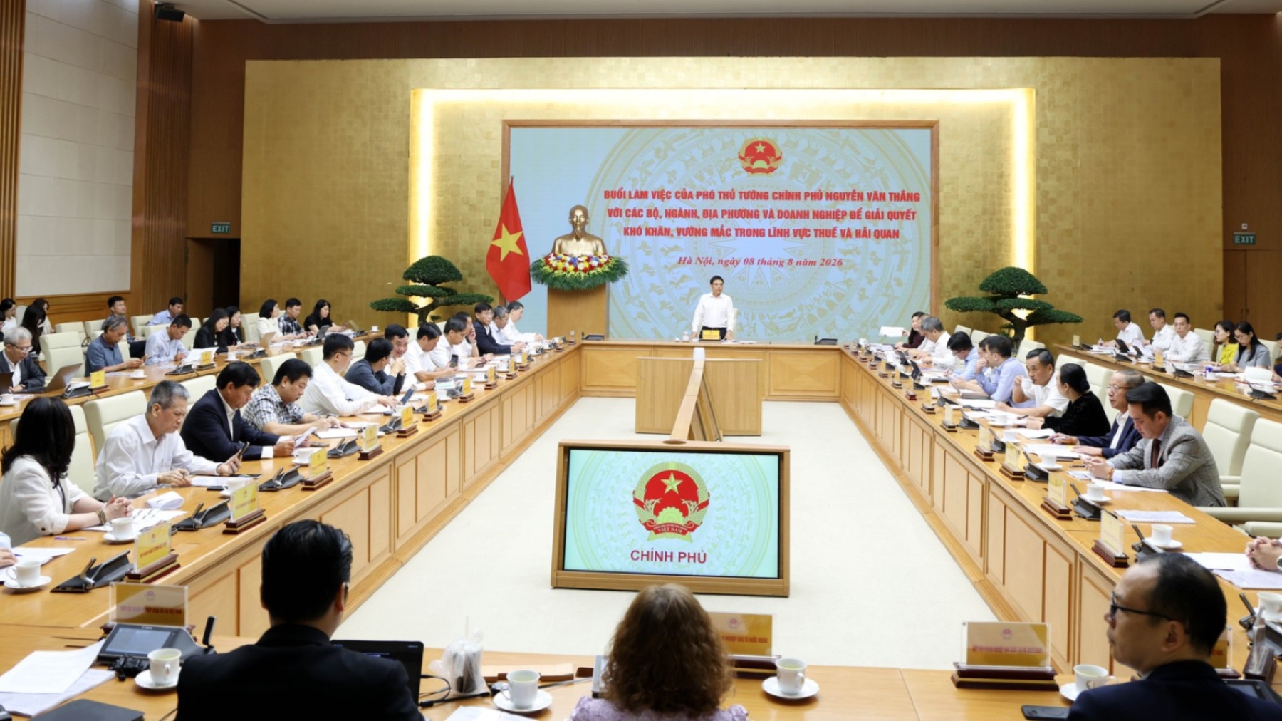 A government meeting room during a dialogue on taxation and customs
