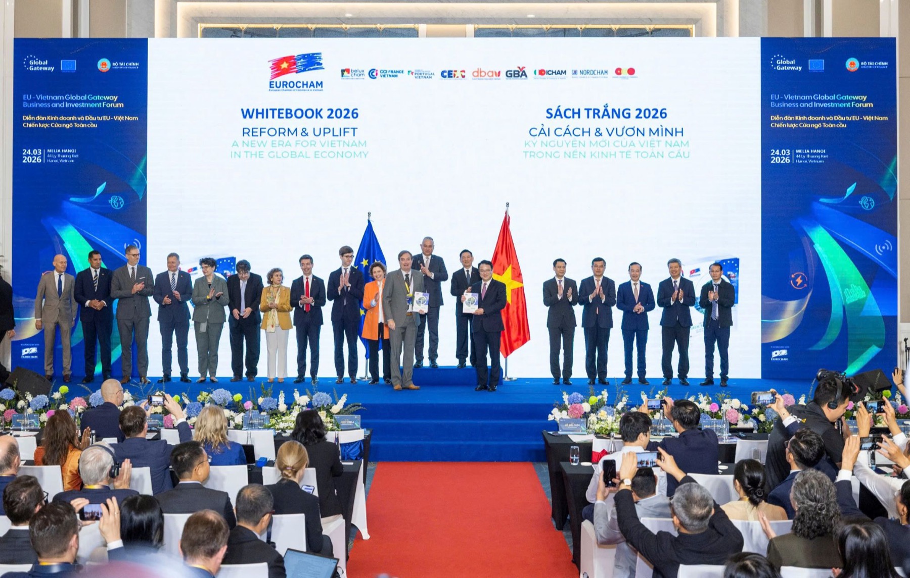 The 2026 Whitebook launch on stage in Hanoi, under bilingual banners reading Whitebook 2026, Reform and Uplift